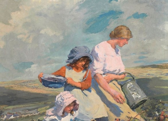 family picking Blabkberries