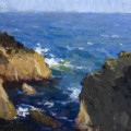 Wild Atlantic Ocean sweeling around rocks off the Irish coast